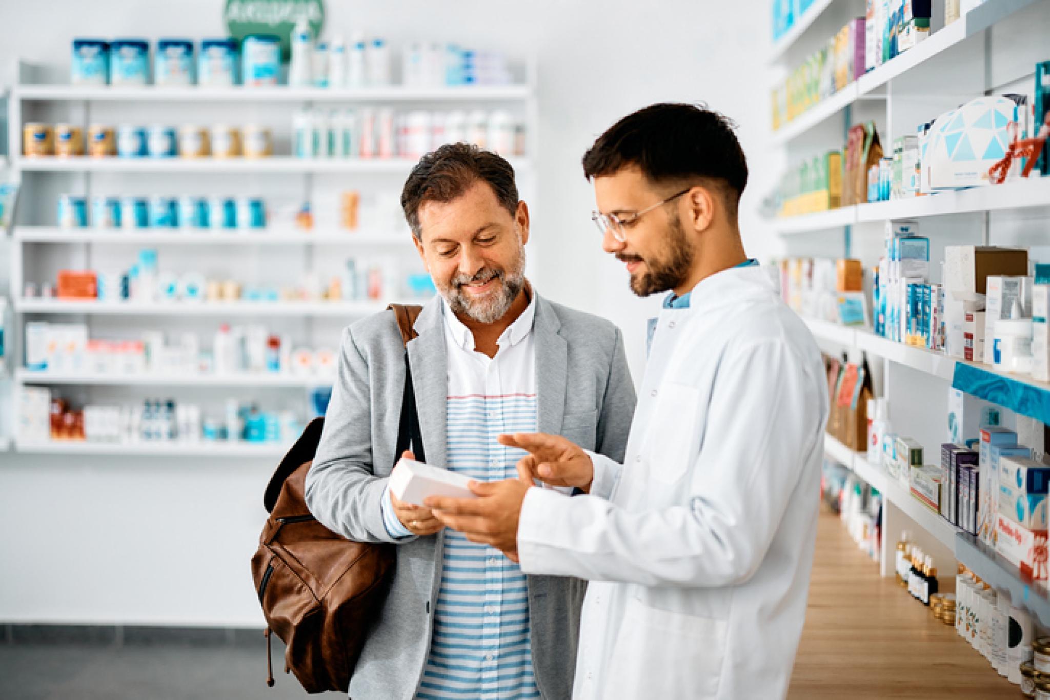 Pharmacist helping patient